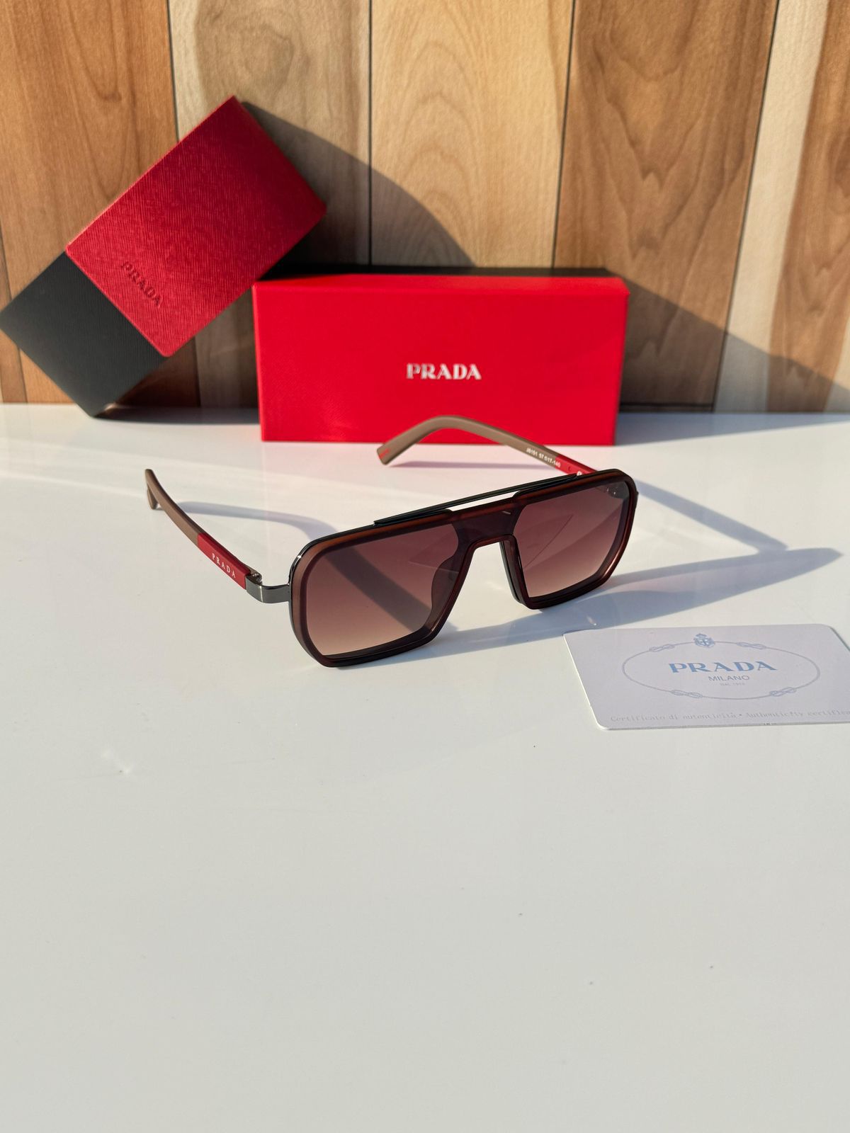 PRADA-SUNGLASSESS