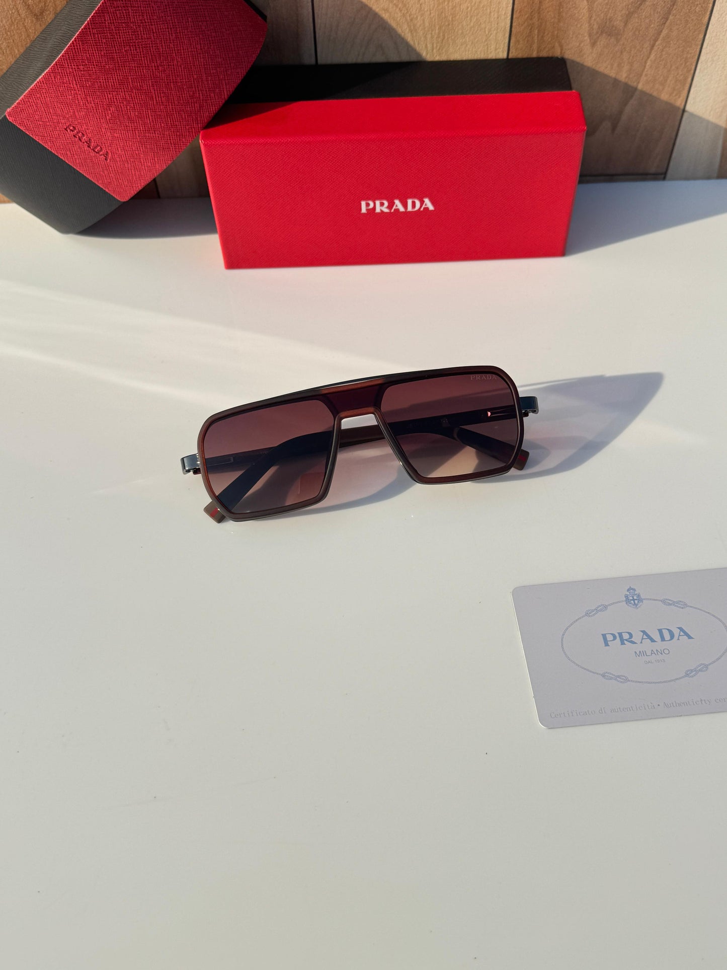 PRADA-SUNGLASSESS